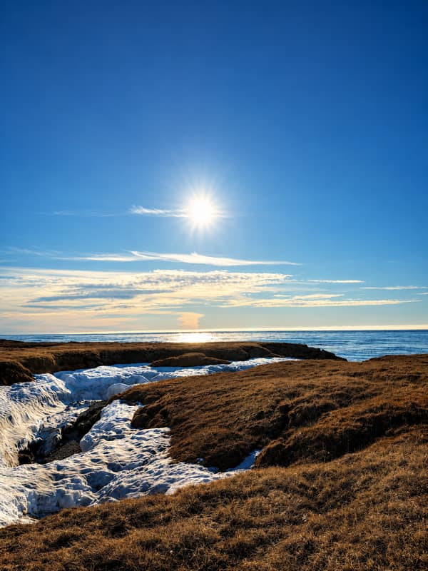 Moonlight over the tundra and sea on the Arctic coast near Kaktovik