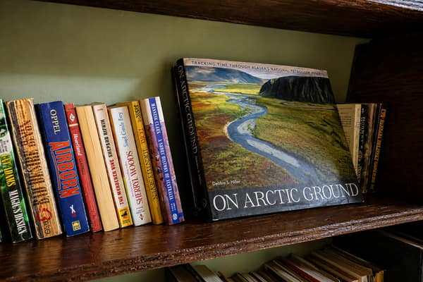 A shelf of Arctic books inside the Waldo Arms lodge