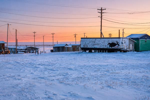 A street in the village of Kaktovik at sunset