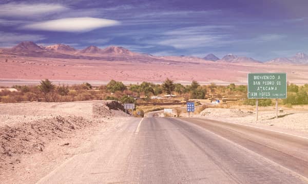 The road into San Pedro de Atacama with the Andes behind