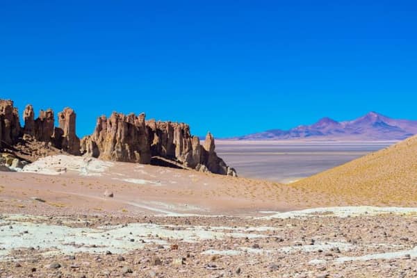 Eroded rock pinnacles rising from the Atacama plateau
