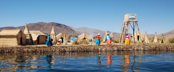 The Uros floating reed islands with residents in traditional dress