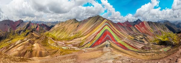 Hikers at Vinicunca, the Rainbow Mountain