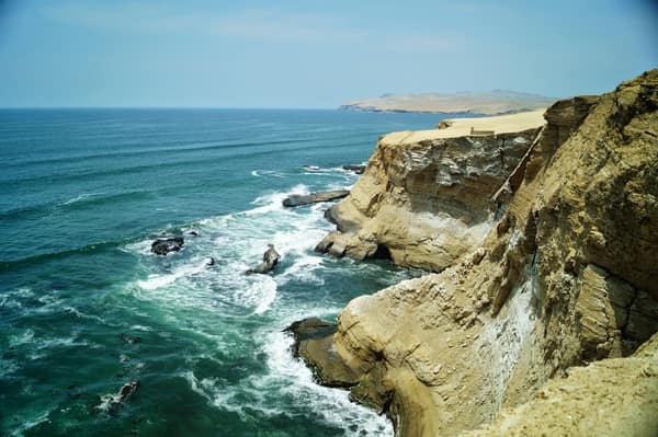 The cliffs and surf of the Paracas National Reserve