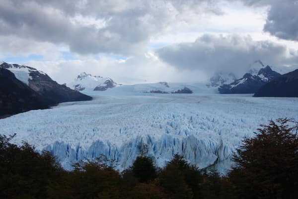 Blue icebergs floating below the face of the Perito Moreno Glacier