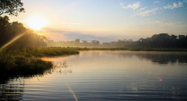 Sunrise over the misty waters of Sandoval Lake